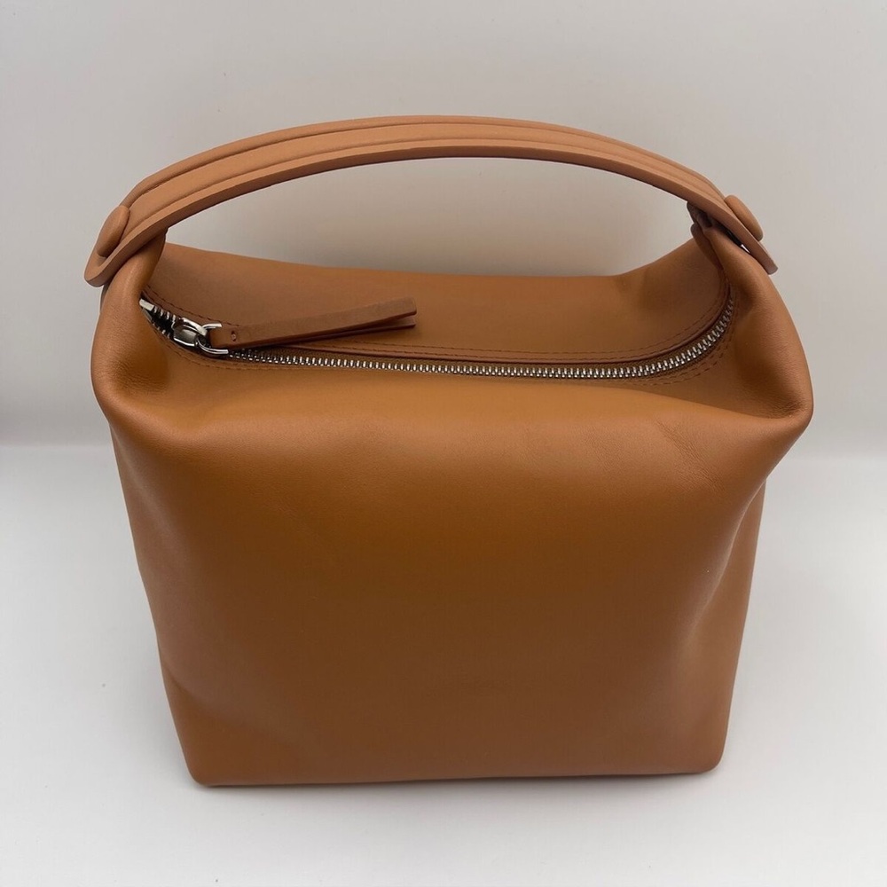 Brown leather lunch bag style handbag